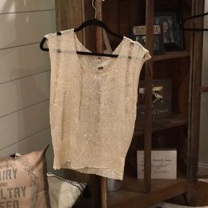 Cream colored distressed tank top